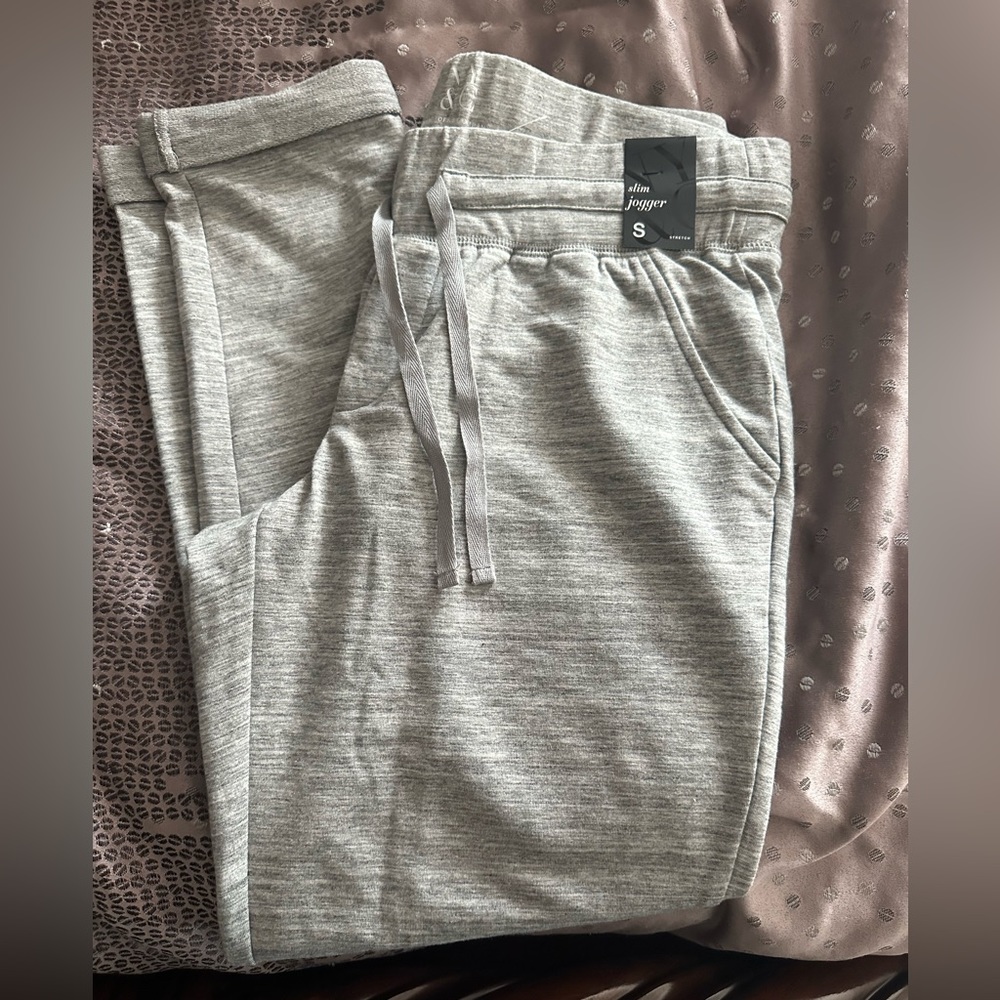 Women’s medium gray joggers from New York and Company. Brand new with tags
